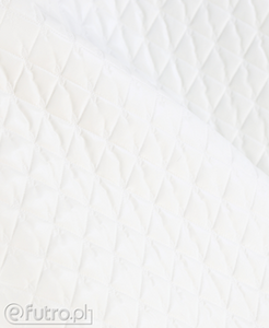 Quilted Material L2 Bow Ecru, with dual-layer insulation and top fabric.